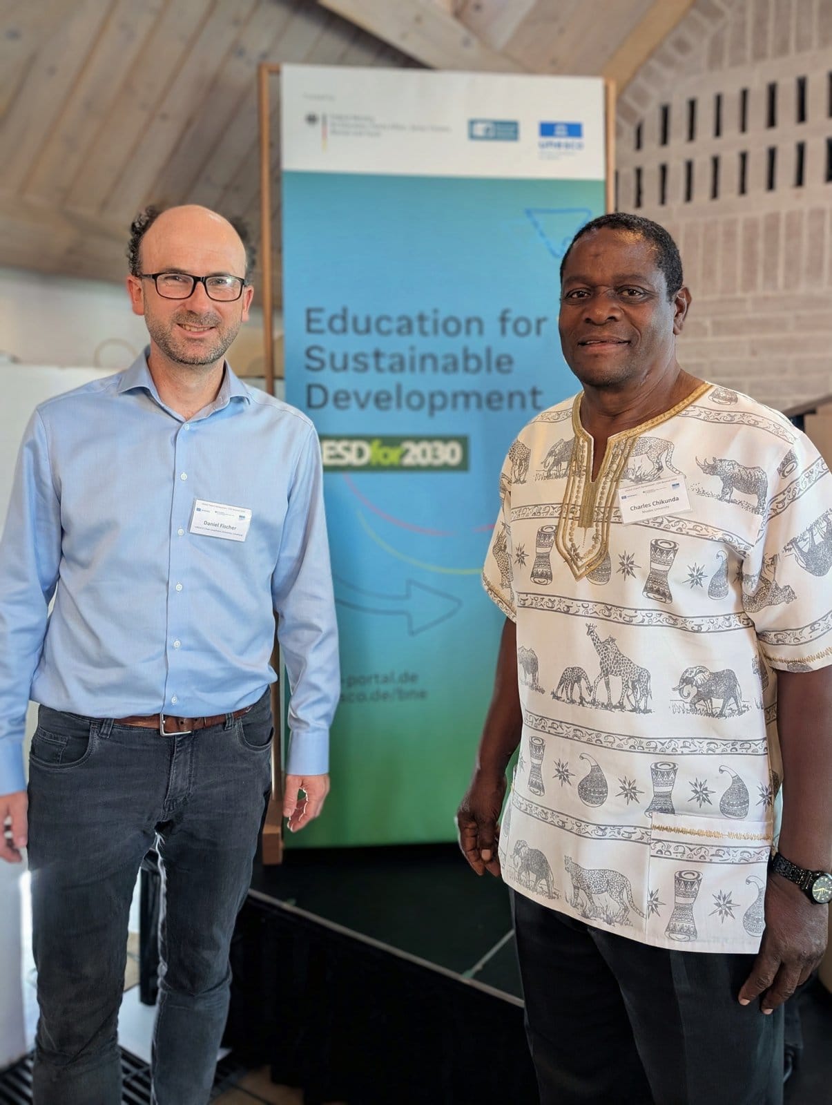 Daniel Fischer and Charles Chikunda at the Munich conference